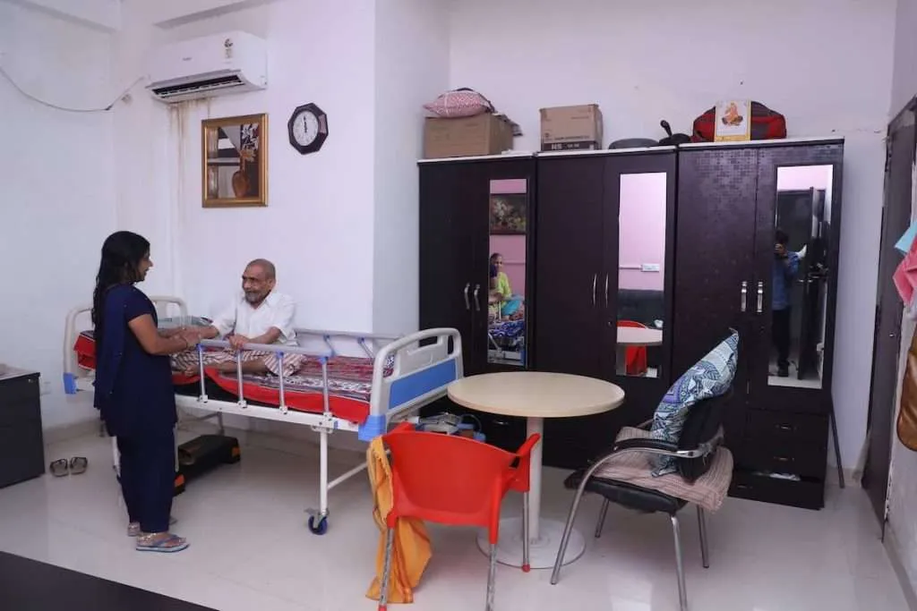 End of Life Care Facility - An attendant is taking care of the elder patient